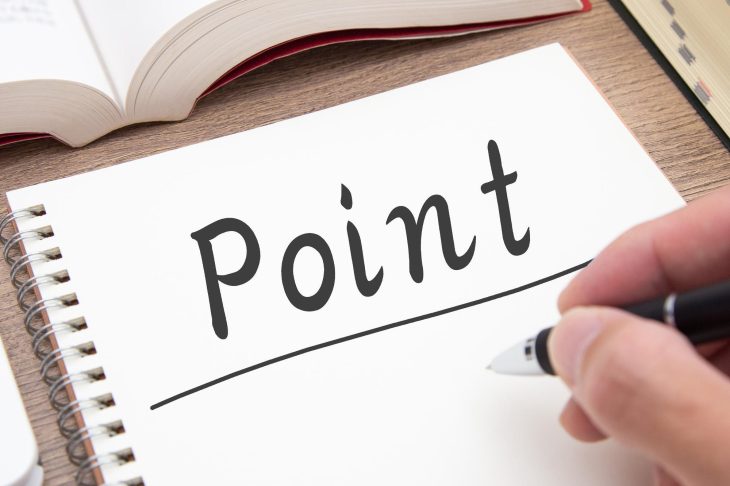 「Point」と黒字で書かれたノート