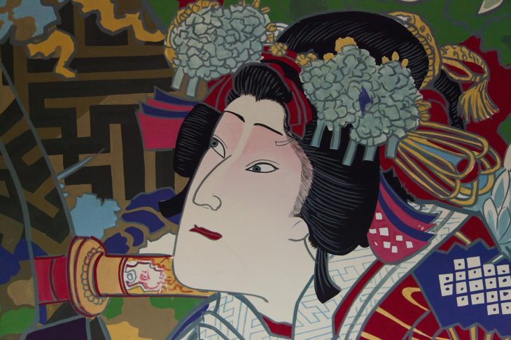日本画風に描かれた花魁の上半身が大きく描かれた作品